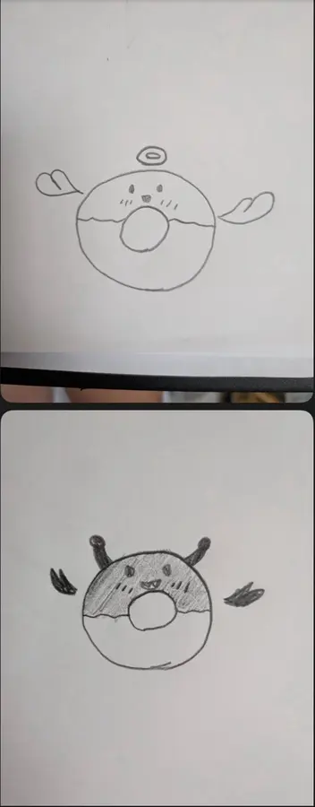 紙に描かれたコウモリ風丸型キャラクターの手描き原画2案